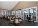 Comfortable dining area with ample seating and large windows offering scenic views of the surrounding landscape at 1105 Flora Vista St, New Port Richey, FL 34655
