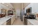 Well-lit kitchen featuring modern appliances, ample counter space, and an open design at 1105 Flora Vista St, New Port Richey, FL 34655