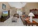 Cozy living area with ample seating, natural light, and an open layout perfect for entertaining at 1105 Flora Vista St, New Port Richey, FL 34655