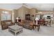 Spacious living room featuring high ceilings, comfortable seating, and an open floor plan at 1105 Flora Vista St, New Port Richey, FL 34655