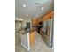 Kitchen with breakfast bar area, stainless steel appliances, and ample cabinet space at 11055 Belle Haven Dr, New Port Richey, FL 34654