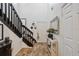 Charming foyer featuring wood-look tile, leading to the home's interior at 1108 Blackwater Dr, Wesley Chapel, FL 33543