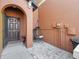 Charming front entry featuring an open-air patio with a swing chair at 1108 Blackwater Dr, Wesley Chapel, FL 33543