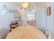 Open floor plan view of the eat-in kitchen and its light fixture at 11158 Heathrow Ave, Spring Hill, FL 34609