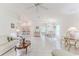 Spacious living area offering a blend of living, dining, and kitchen spaces for easy entertaining at 11158 Heathrow Ave, Spring Hill, FL 34609