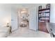 Versatile office area with open doorways leading to other rooms; tile flooring throughout at 11158 Heathrow Ave, Spring Hill, FL 34609