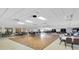 Large community center with a dance floor and ample seating arrangement at 11308 Mollymawk Ct, New Port Richey, FL 34654