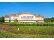 Wellington at Seven Hills community entrance with manicured landscaping at 11389 Mcnally Dr, Spring Hill, FL 34609