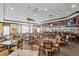 Warm and welcoming dining area with a fully equipped bar and comfortable seating arrangements at 11389 Mcnally Dr, Spring Hill, FL 34609