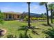A lovely backyard with a screened-in pool and lush landscaping, perfect for outdoor enjoyment and privacy at 13155 Cori Loop, Spring Hill, FL 34609