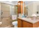 Beautiful bathroom with a glass shower, a toilet, and a vessel sink at 13155 Cori Loop, Spring Hill, FL 34609