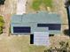 Aerial view of roof, solar panels, and backyard at 13180 Lawrence St, Spring Hill, FL 34609