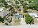 Overhead view of home displaying the yard, roof, solar panel and street access at 13180 Lawrence St, Spring Hill, FL 34609