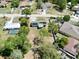Bird's eye view of house showing roof, yard, solar panels, and neighborhood at 13180 Lawrence St, Spring Hill, FL 34609