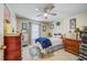Charming bedroom with neutral tones, tasteful decor, and a cozy ambiance, perfect for relaxation at 13317 Pinellas Ave, Spring Hill, FL 34609