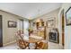 Comfortable dining area with wooden furniture, vintage decor, and a built-in hutch at 13317 Pinellas Ave, Spring Hill, FL 34609
