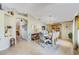 Elegant dining room featuring neutral decor, modern lighting, and seamless access to living spaces at 13317 Pinellas Ave, Spring Hill, FL 34609