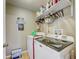 A well-equipped laundry room with modern appliances and ample storage space at 13317 Pinellas Ave, Spring Hill, FL 34609