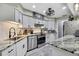Updated kitchen with modern appliances, sleek countertops, and white cabinetry at 13460 Pia Ct, Spring Hill, FL 34609