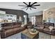Cozy living room showcasing vaulted ceilings and stylish, comfortable furniture at 13460 Pia Ct, Spring Hill, FL 34609