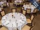 Formal dining room setup with elegant table settings and ample seating at 1407 Hickory Moss Pl, Trinity, FL 34655
