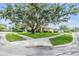 Charming corner lot featuring lush lawns and mature shade trees offering curb appeal at 1407 Hickory Moss Pl, Trinity, FL 34655