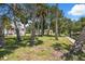 A waterfront lot with mature trees at 14220 Hendry Ct, Hudson, FL 34667