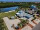Spacious waterfront property with manicured lawn and proximity to water activities at 1620 Sea Breeze Dr, Tarpon Springs, FL 34689