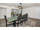 Well-lit dining room with direct kitchen access, ideal for entertaining and Gathering gatherings at 1620 Sea Breeze Dr, Tarpon Springs, FL 34689