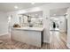 Open concept kitchen showcases a center island, ample counter space and modern appliances at 1620 Sea Breeze Dr, Tarpon Springs, FL 34689