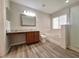 Bright bathroom features a shower and bath at 19551 Timberbluff Dr, Land O Lakes, FL 34638