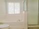Close-up on tub and shower area of updated bathroom at 19551 Timberbluff Dr, Land O Lakes, FL 34638