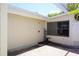 Exterior features a private outdoor shower, brick pavers, and a sunshade, perfect for relaxation and convenience at 20960 Little Magens Loop, Lutz, FL 33558