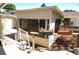 Backyard deck with flower boxes and an enclosed porch. Great area for relaxation at 20960 Little Magens Loop, Lutz, FL 33558
