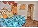 This is a large main bedroom with an open doorway to the ensuite at 20960 Little Magens Loop, Lutz, FL 33558