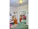 A home office with a sliding mirror closet at 20960 Little Magens Loop, Lutz, FL 33558