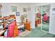 A home office with wood furniture and art on the walls at 20960 Little Magens Loop, Lutz, FL 33558