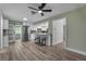 Eat-in kitchen features stainless steel appliances, granite countertops, and a stylish breakfast bar at 2866 Thistle N Ct, Palm Harbor, FL 34684