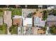 An aerial view shows the layout of the home relative to the community waterway and boat docks at 3907 Headsail Dr, New Port Richey, FL 34652