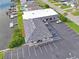 An aerial view of the home showing the well-maintained parking lot and private boat docks at 3907 Headsail Dr, New Port Richey, FL 34652