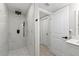 Modern bathroom features an open shower with marble accents and black hardware at 3907 Headsail Dr, New Port Richey, FL 34652