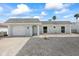 Charming single-Gathering home featuring an attached garage and a manicured front yard at 3907 Headsail Dr, New Port Richey, FL 34652