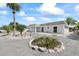 Well-maintained single-story home with rock landscaping and a two-car garage at 3907 Headsail Dr, New Port Richey, FL 34652
