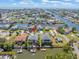 Breathtaking aerial view of a canal-front home in a vibrant coastal community at 4292 Tahiti Dr, Hernando Beach, FL 34607