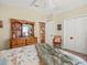 Comfortable bedroom featuring a ceiling fan, closet, and light-colored walls at 4292 Tahiti Dr, Hernando Beach, FL 34607