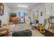 Cozy bonus room with comfortable seating, perfect for relaxing and entertaining guests at 4292 Tahiti Dr, Hernando Beach, FL 34607