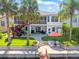 Charming waterfront home with a private dock, patio, and outdoor living spaces at 4292 Tahiti Dr, Hernando Beach, FL 34607