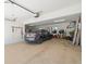 Spacious two-car garage with ample storage, an open area, and a well-lit interior at 4292 Tahiti Dr, Hernando Beach, FL 34607