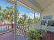 Relaxing screened lanai showcasing views, comfortable seating, and a tranquil atmosphere at 4292 Tahiti Dr, Hernando Beach, FL 34607