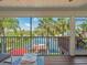 Inviting screened lanai featuring tropical views and outdoor seating at 4292 Tahiti Dr, Hernando Beach, FL 34607